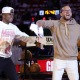 Mike McDaniel celebrates at a Miami Heat game.